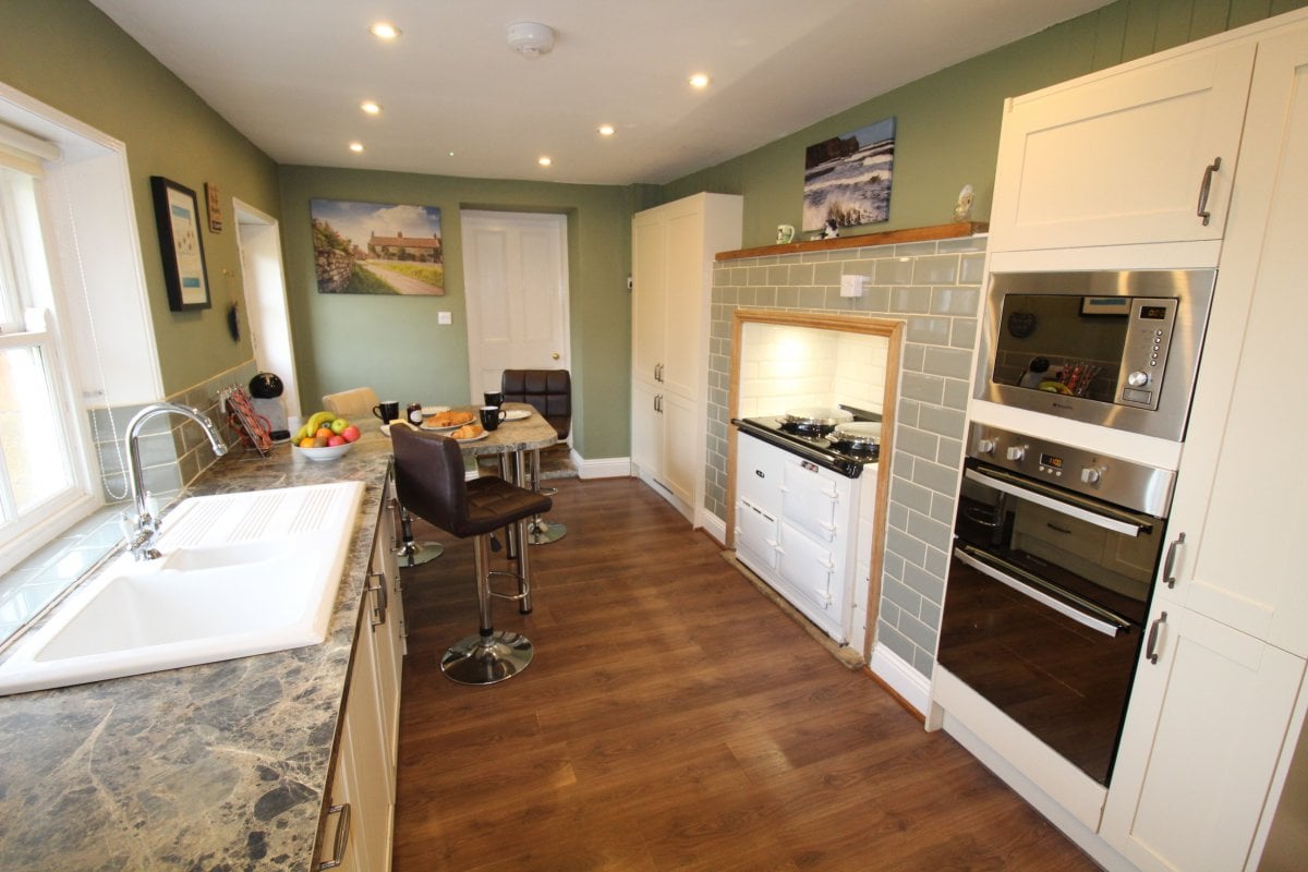 Helena - Kitchen with breakfast bar, Aga, double oven, microwave and hob
